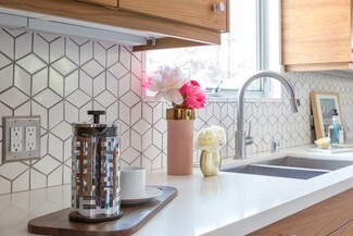 Kitchen Backsplash Ideas Using Geometric Tile and Walnut