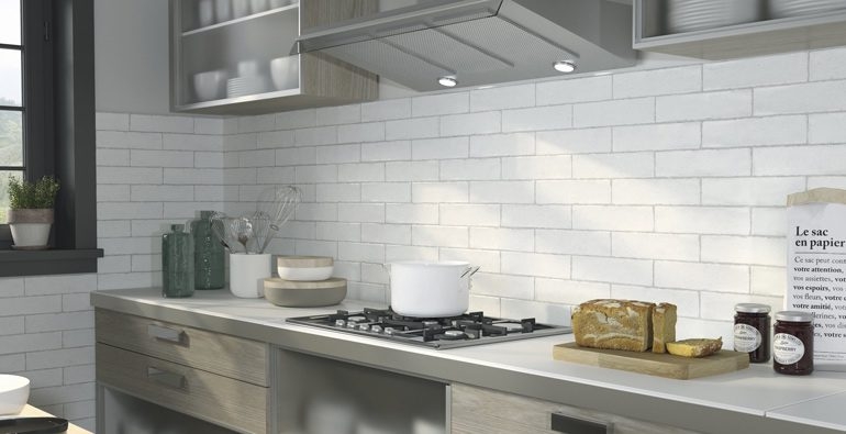 Kitchen Backsplash: Textured Subway Tile in Brick Pattern