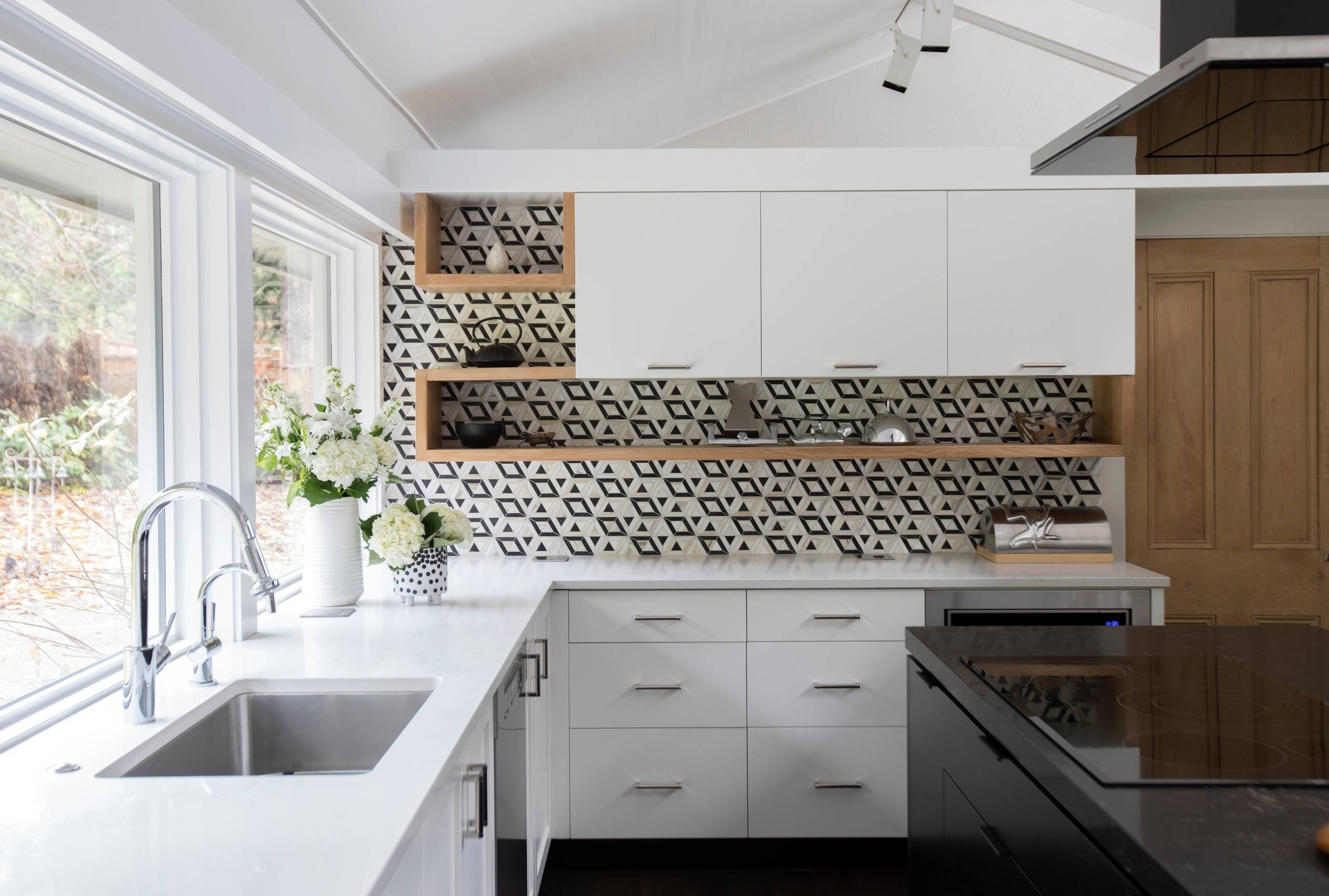 Kitchen Backsplash With Integrated Wood Shelving and Pattern
