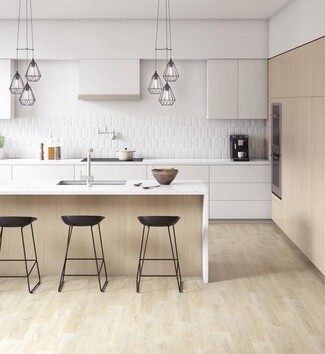 Kitchen Interior With White Waterfall Island and Picket Tile