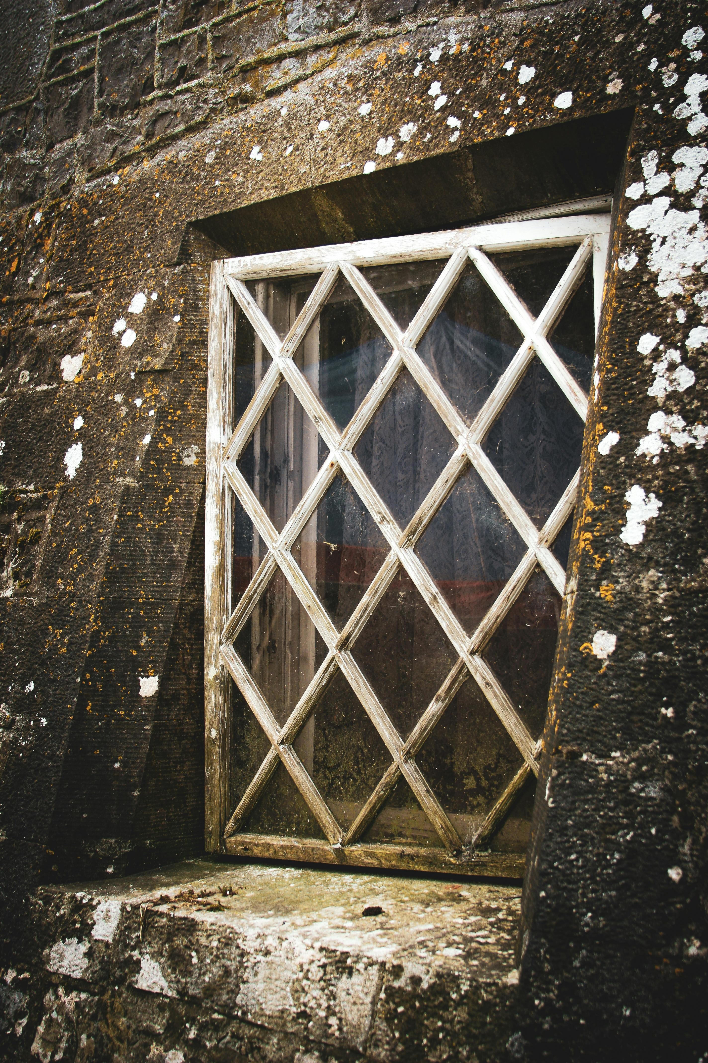 Lattice Window - Rustic Stone Wall Recessed Casing Diamond Grid Panel