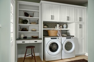 Laundry Room Cabinetry with Integrated Workstation Desk