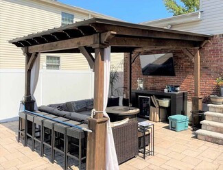Lean To Pavilion: Dark Wood Stain Entertainment Wall