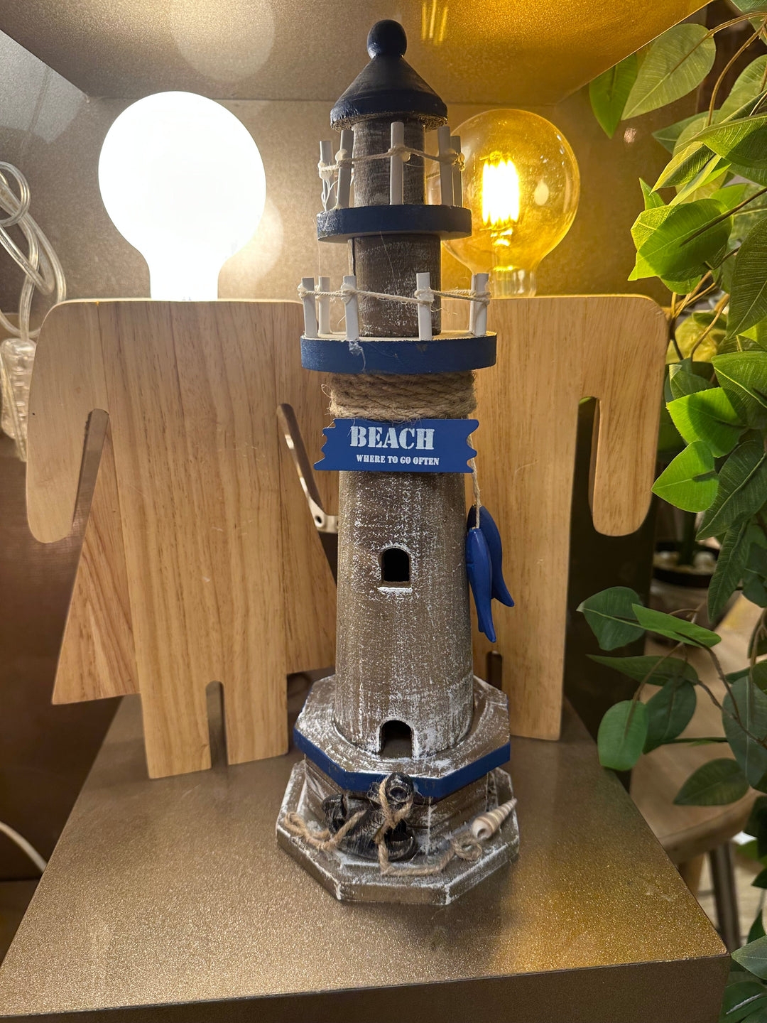 Lighthouse Ornament with Blue Fish Charms and Distressed Wood Finish