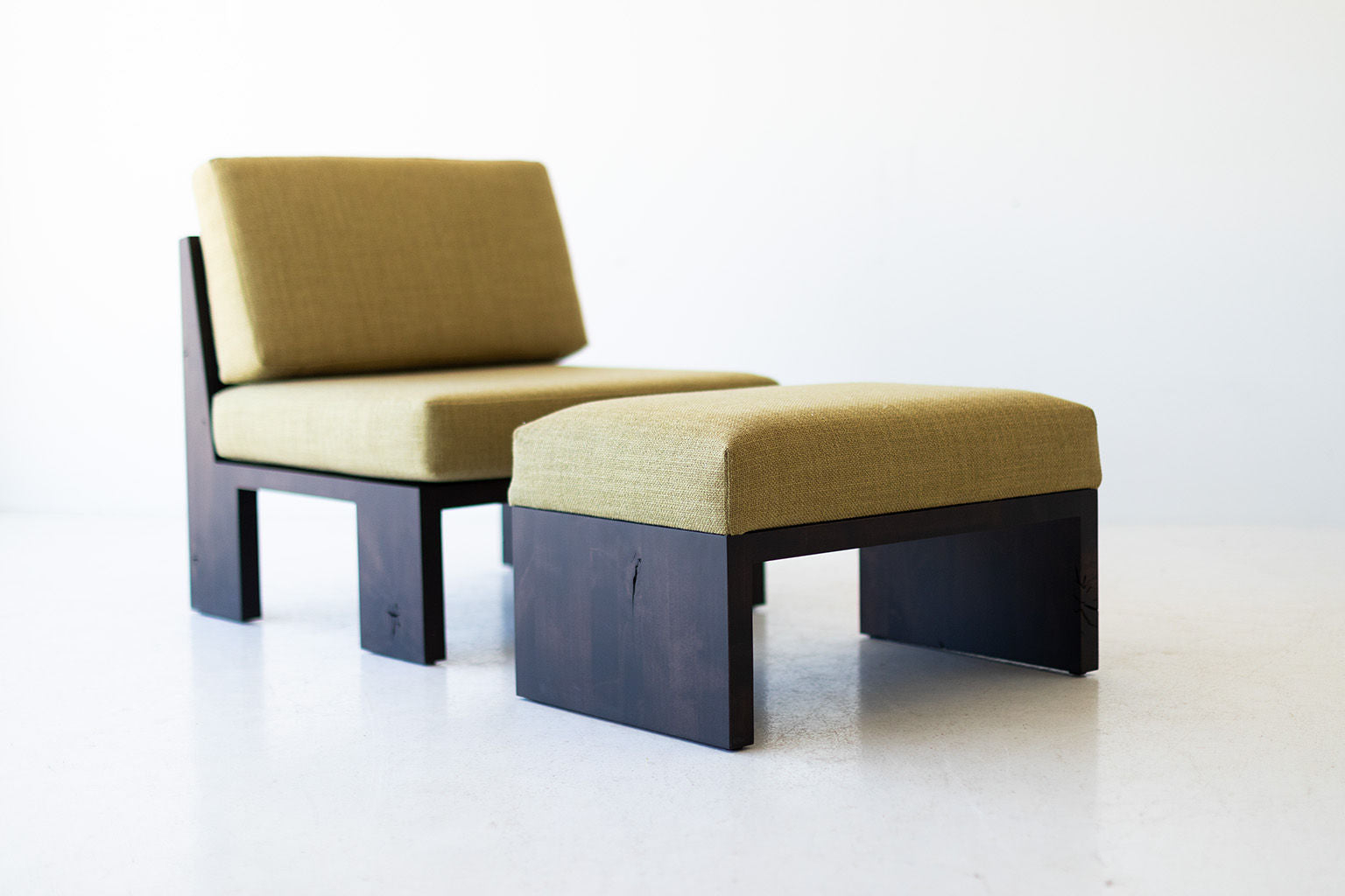 Lounge Chair Featuring Olive Green Fabric and Block Wood Base