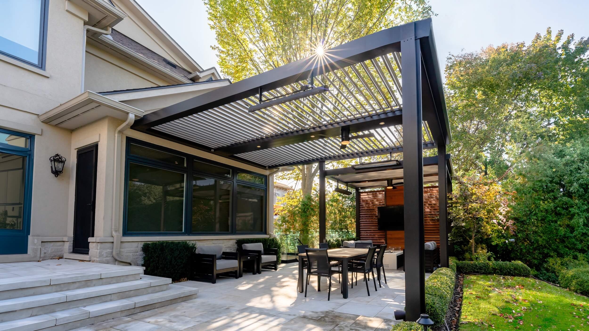 Louvered Pergola With Integrated Heating and Black Frame