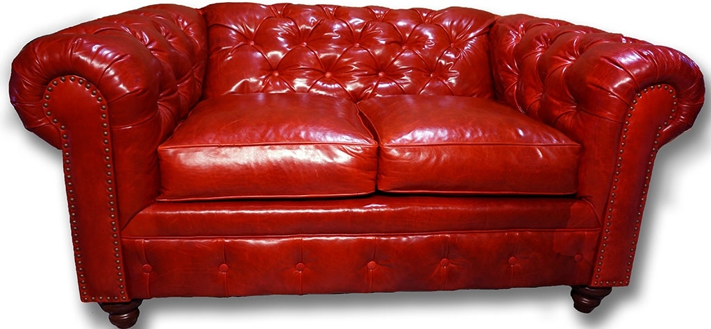 Loveseat with Antiqued Finish and Red Nailhead Trim