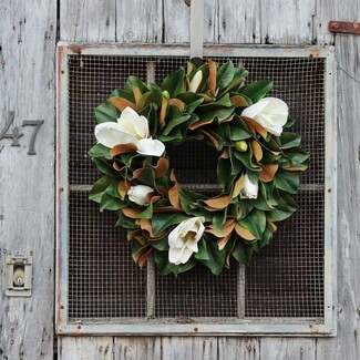 Magnolia Wreath on Barn Door Backdrop with White Blossoms