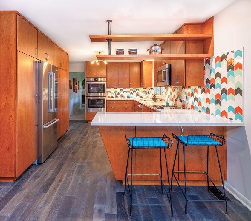 Mid Century Kitchen Design With Teal Tile and Pipe Shelving