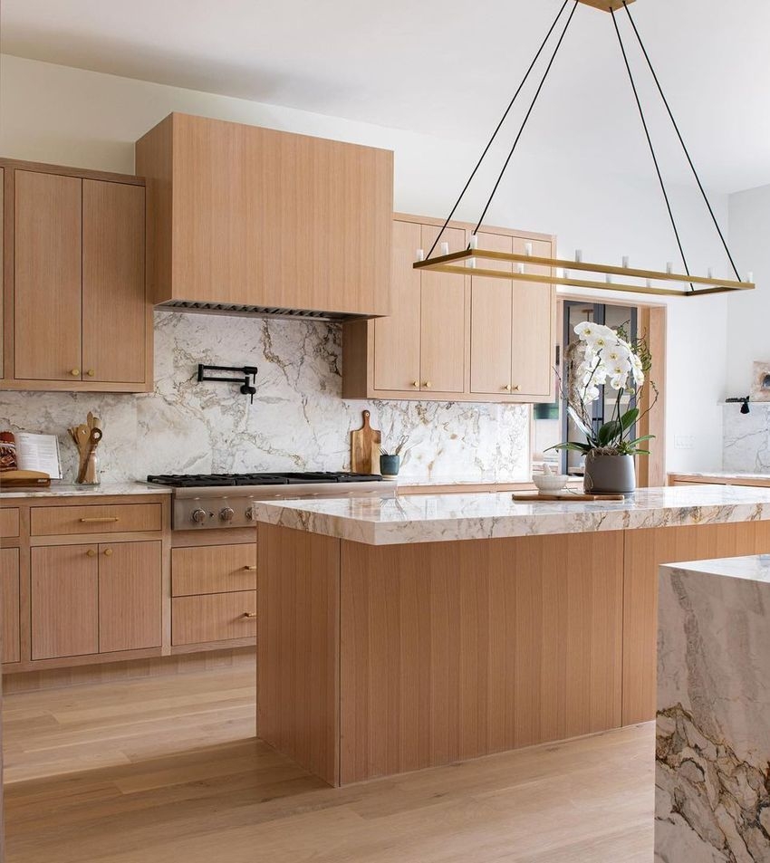Mid Century Kitchen With Vertical Grain Wood and Marble