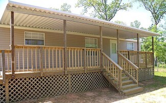 Mobile Home Porch Corrugated Metal Roof and Lattice
