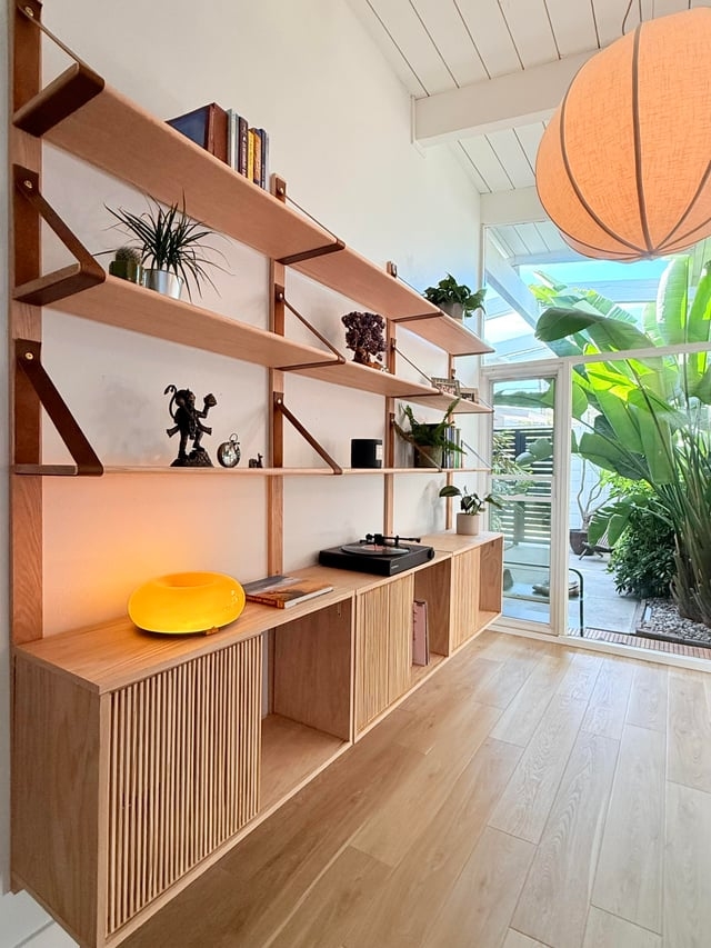 Modular Shelving Unit with Leather Strap Supports and Slats