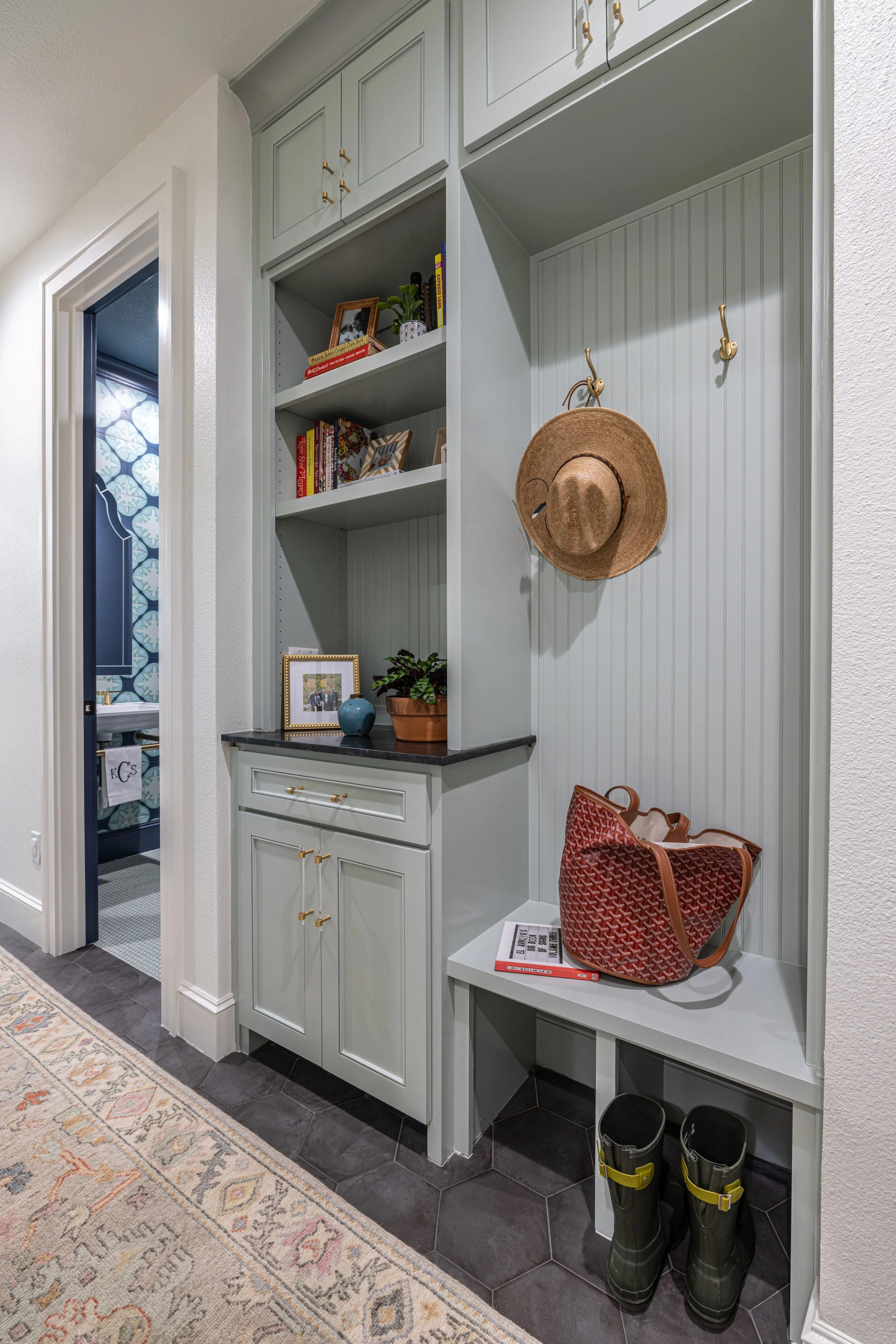 Mudroom Built In with Sage Green Paint and Brass Hooks