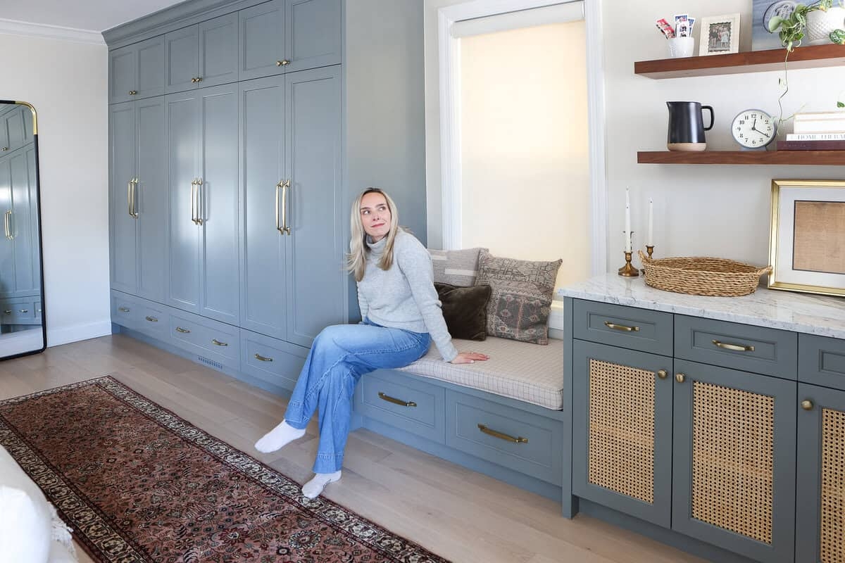 Mudroom Cabinetry with Cane Door Inserts and Window Seat