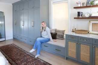 Mudroom Cabinetry with Cane Door Inserts and Window Seat