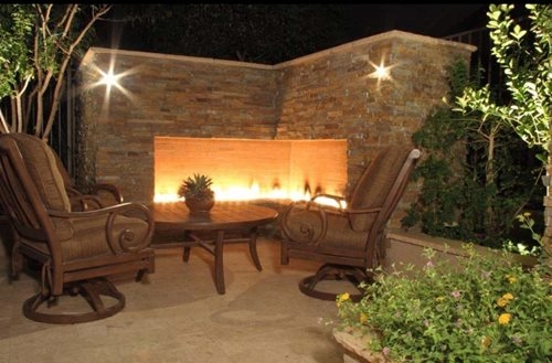 Outdoor Fireplace Corner Configuration and Scrolled Seating