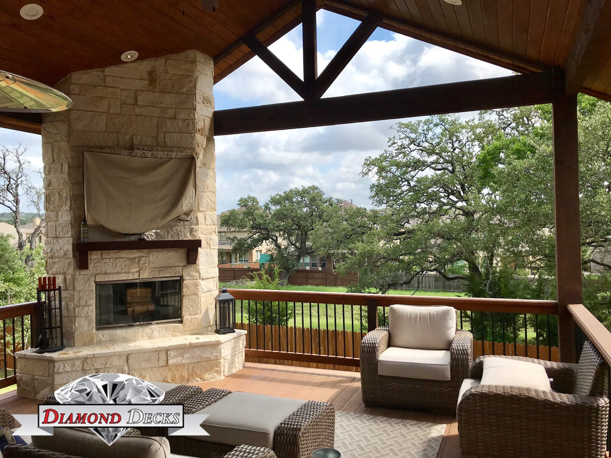 Outdoor Fireplace Floor to Ceiling Stone with Gabled Truss