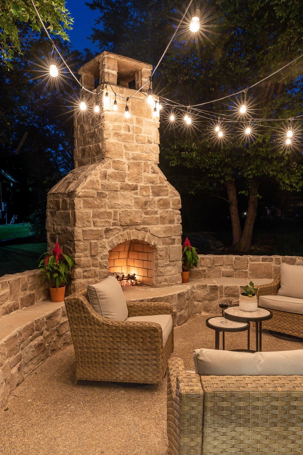 Outdoor Fireplace Masonry with Overhead Edison String Lights