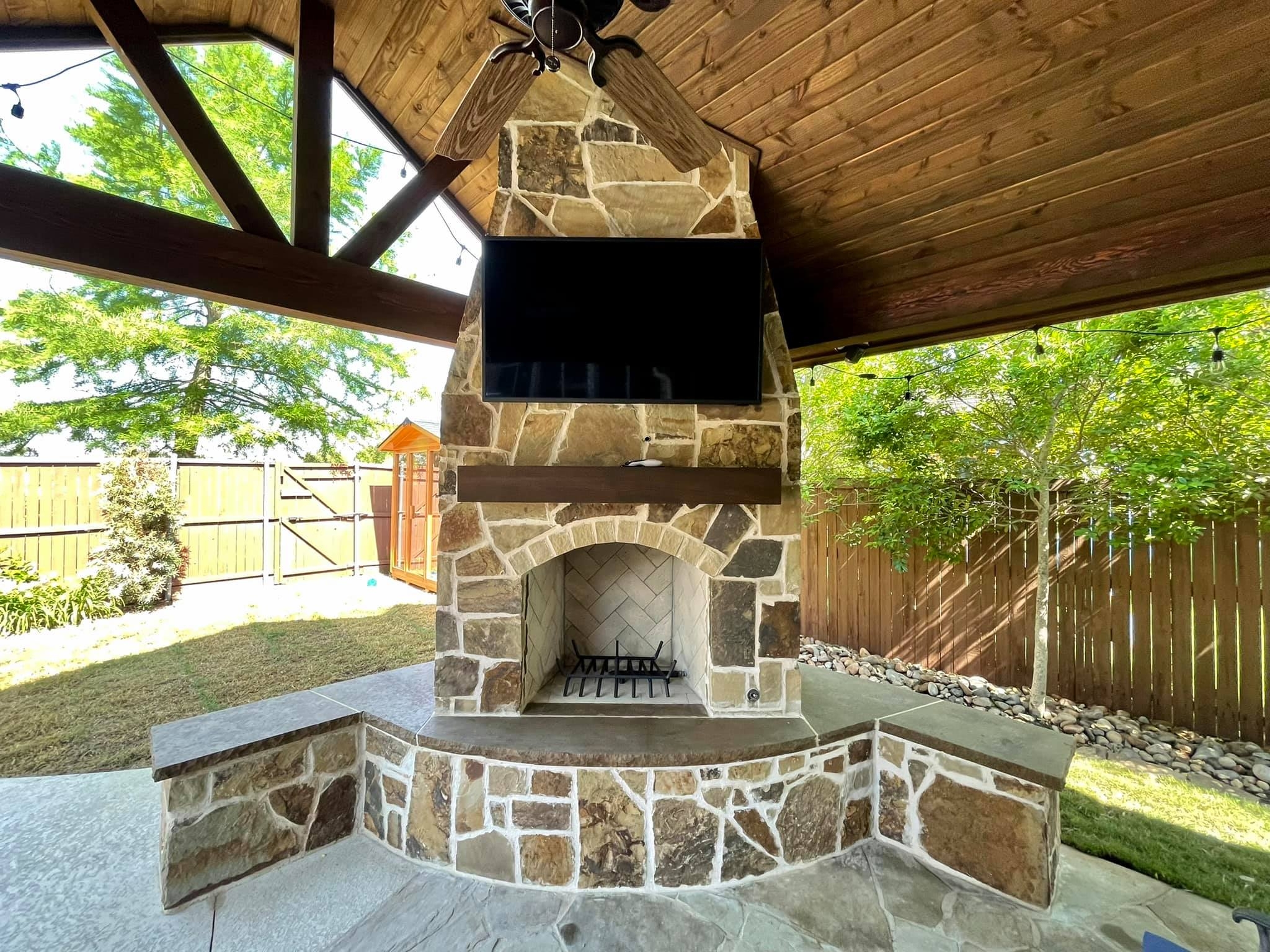 Outdoor Fireplace Stone with Herringbone Masonry and Bench