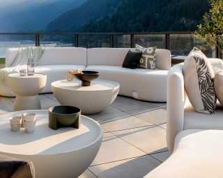 Outdoor Sectional with Curved Modular Design and Bowl Tables