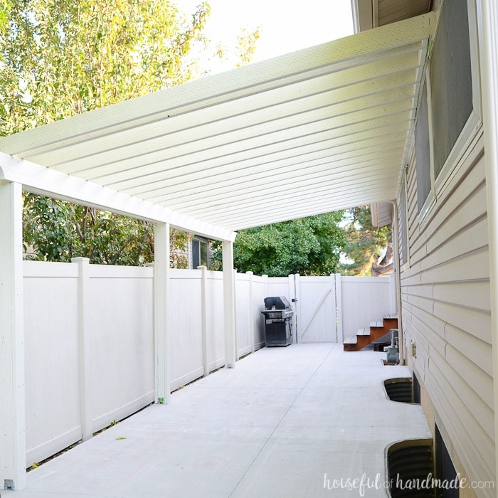 Patio Pergola With White Vinyl Aesthetic and Slatted Shade