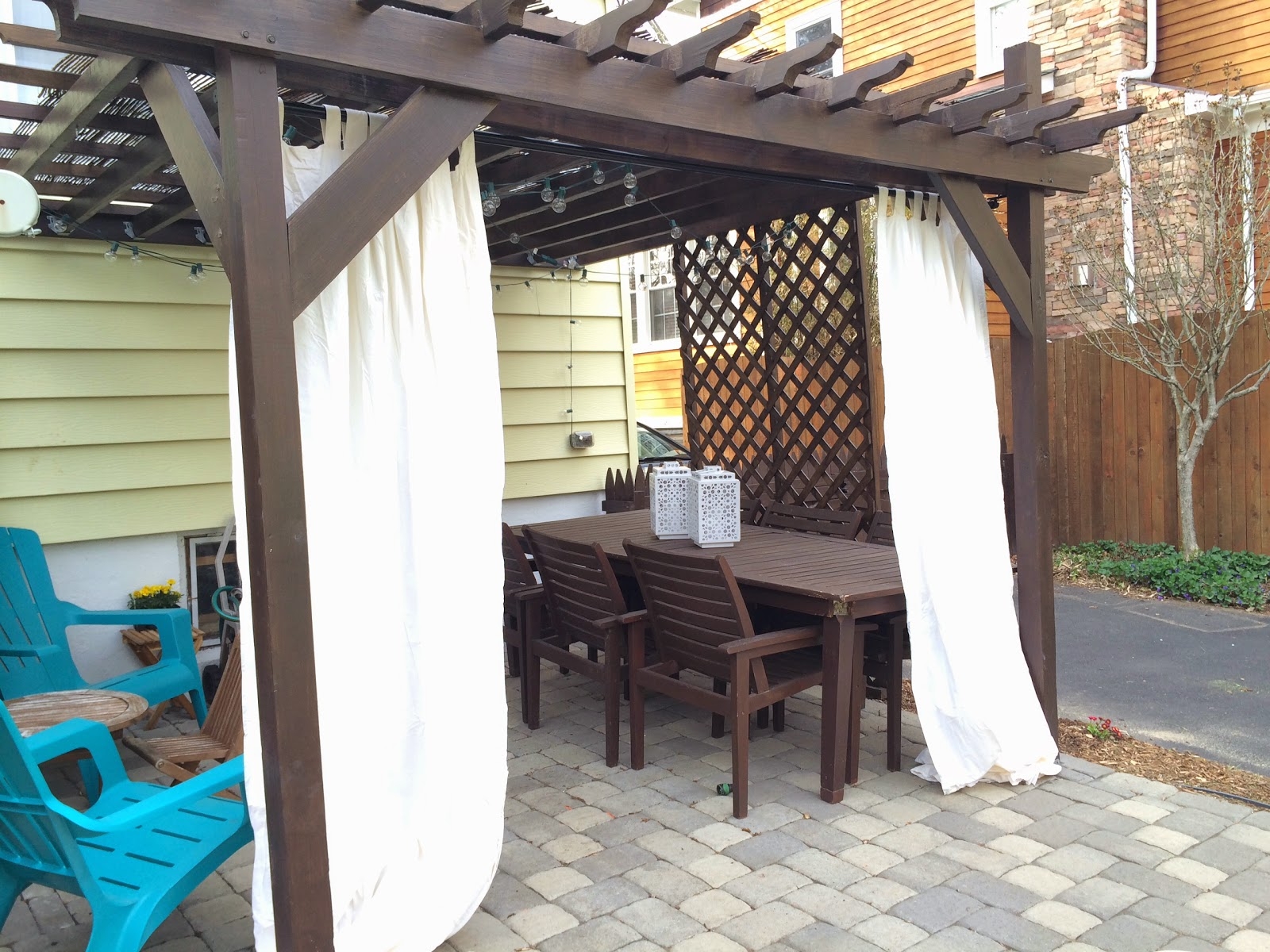 Pergola Dark Wood Frame White Curtains Patio Design