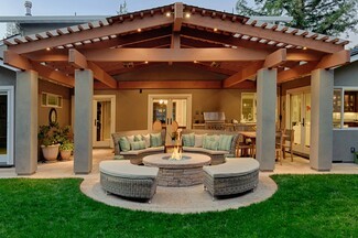 Pergola Patio Set With Gabled Timber Roof and Fire Pit