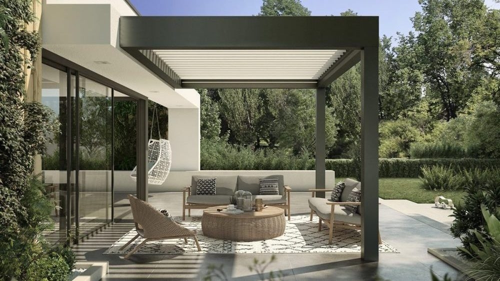 Pergola With Woven Rattan Accents and Geometric Rug