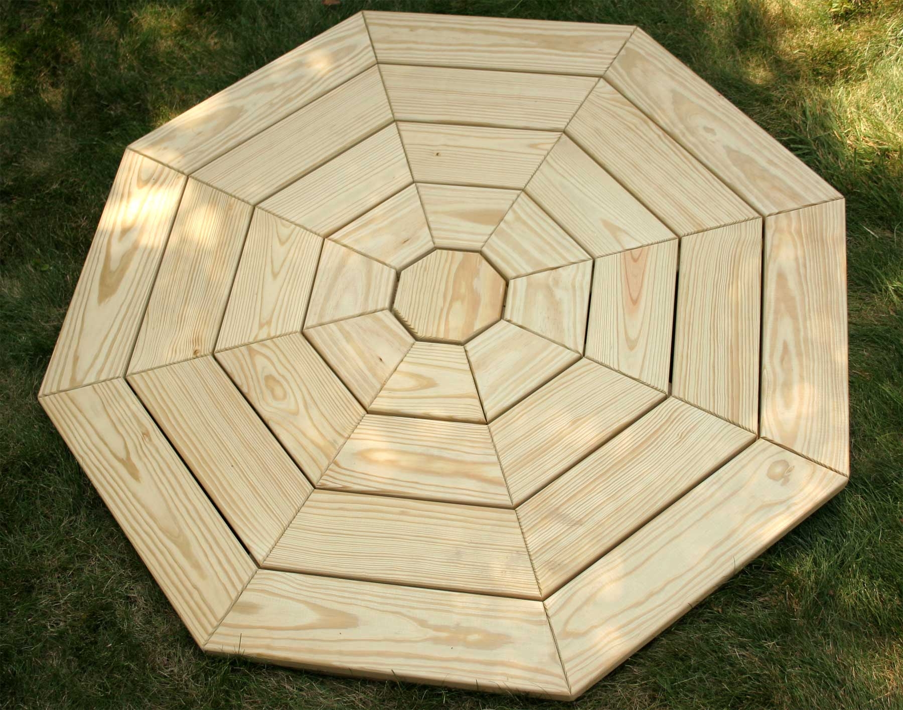 Picnic Table featuring Radial Plank Design and Wood Grain