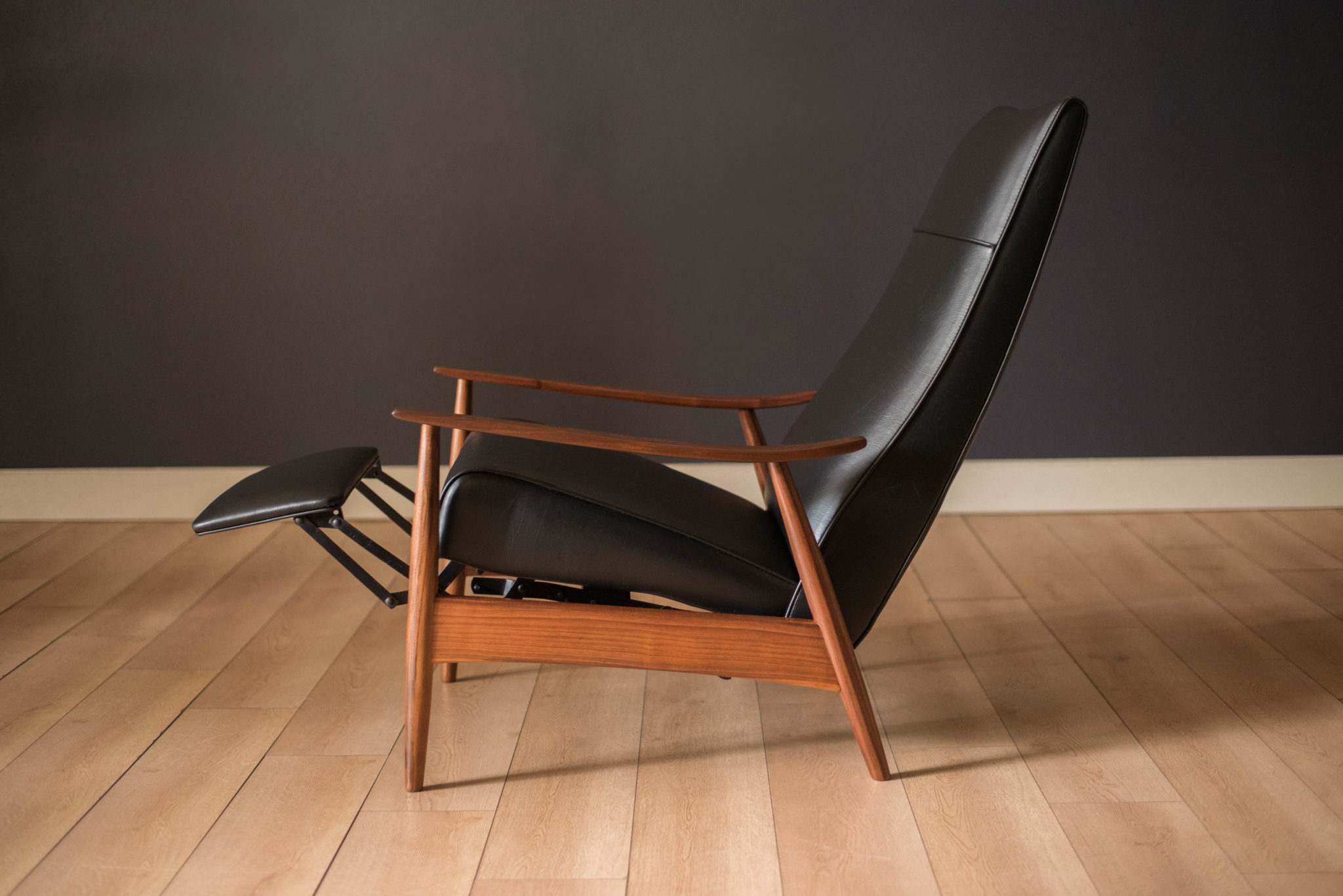 Recliner Chair with Sculptural Wood Frame and Slim Profile