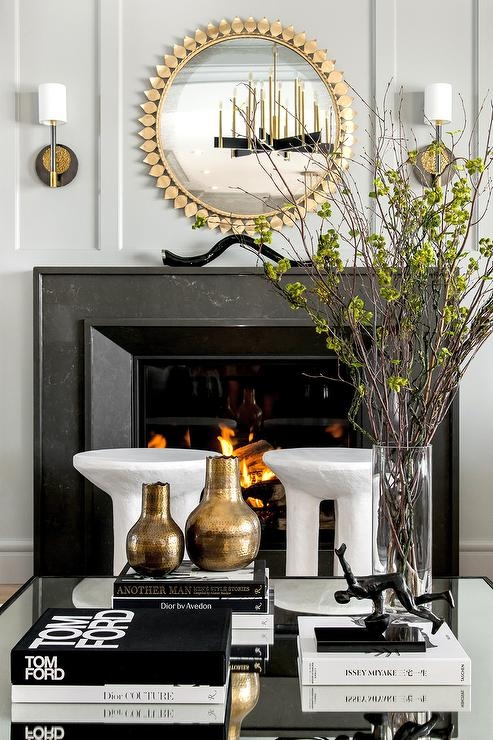 Round Mirror: Antique Gold Sunburst Petal Frame Black Marble Surround