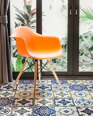 Shell Armchair in Vibrant Orange over Beja Vinyl Flooring