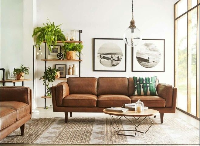 Sofa with Round Geometric Coffee Table and Pipe Shelf