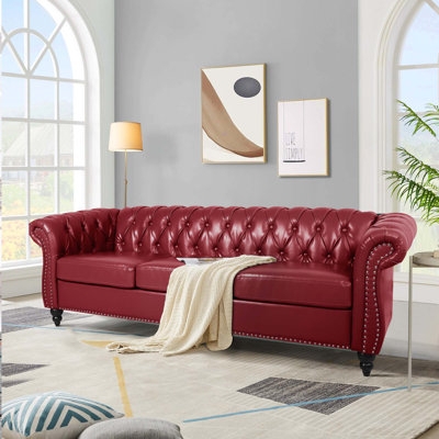 Sofa with Ruby Red Upholstery and Classic Rolled Arm Design