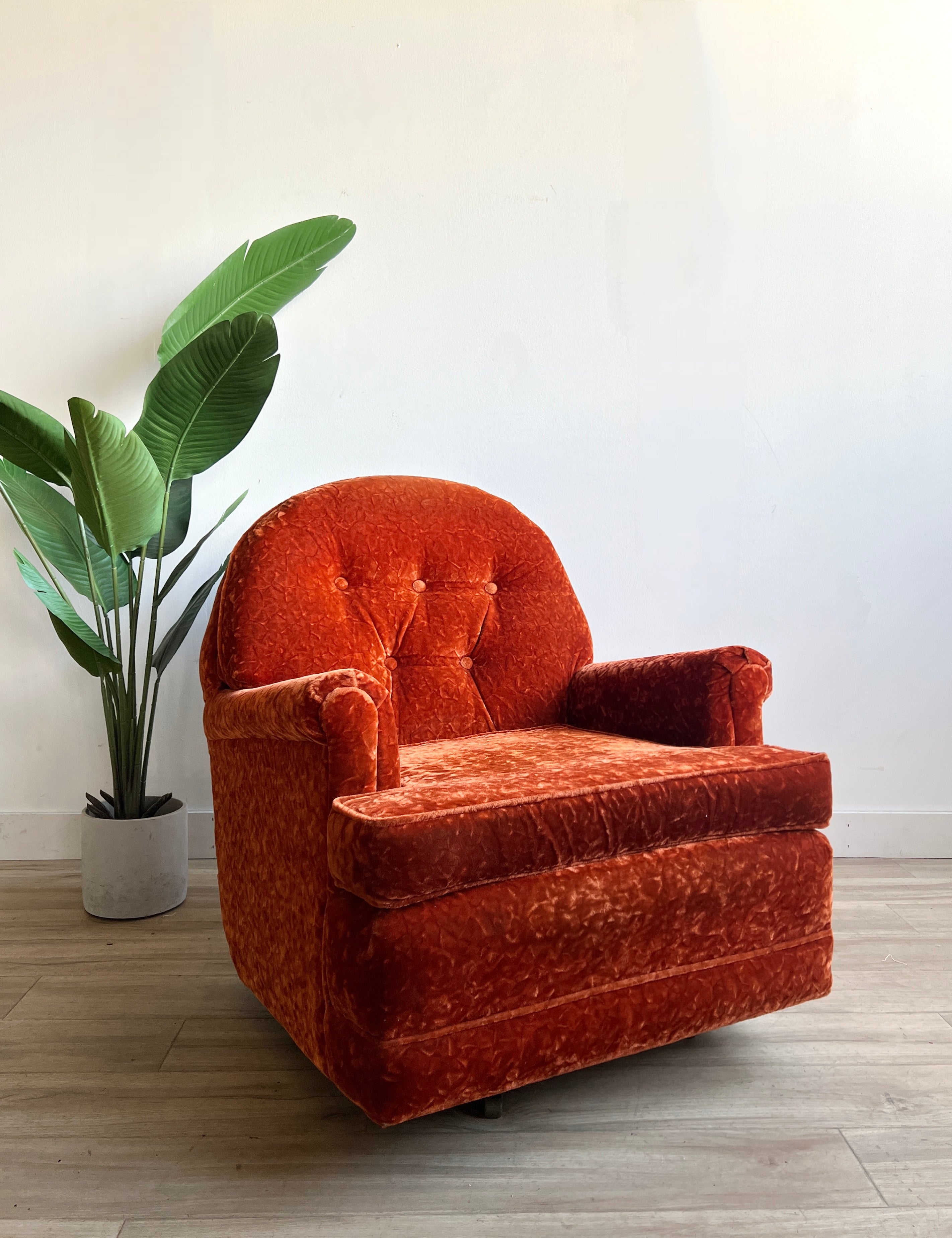 Swivel Rocker with Button Tufted Back in Burnt Orange Velvet