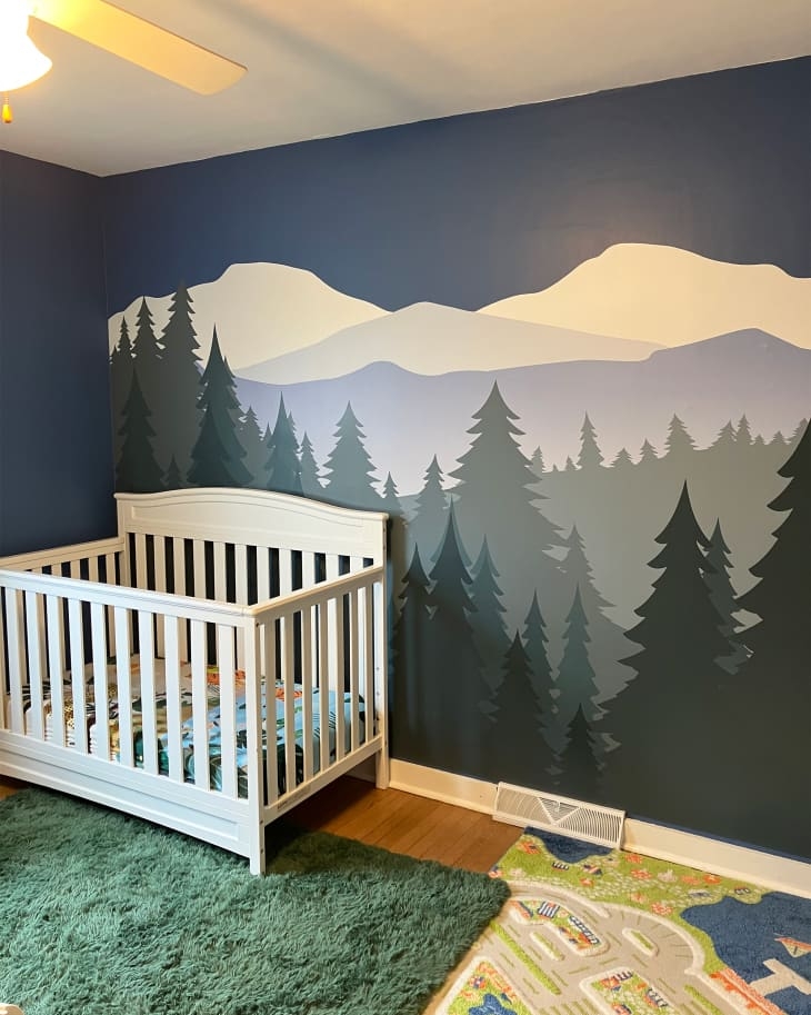 Wall Mural: Forest Green Accents Layered Mountain Landscape