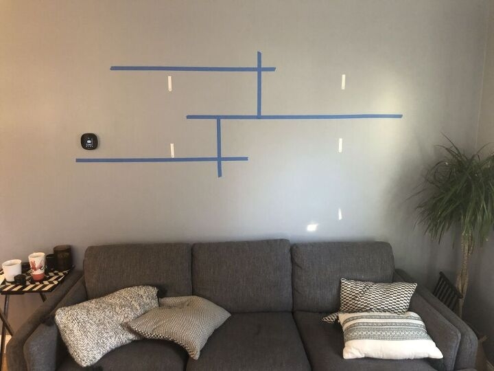Wall Shelf Layout with Blue Tape Geometric Planning