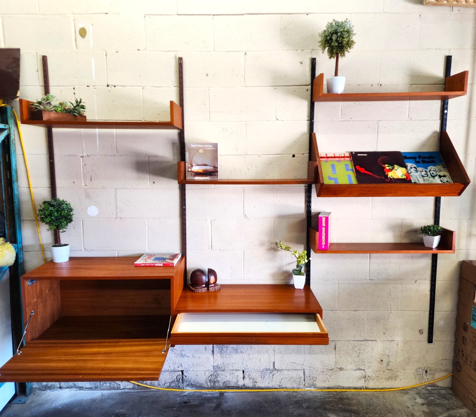Wall Unit Includes Angled Record Display and Floating Desk